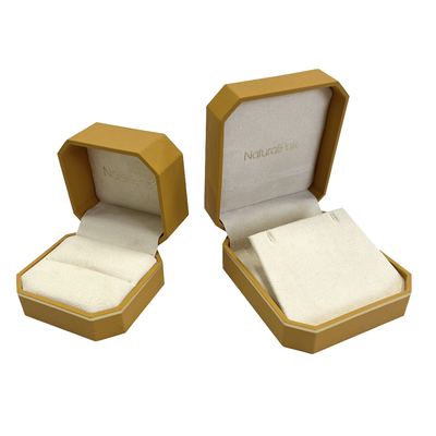 Achteck-Form fertigte Schmuck-Verpackenkasten mit Goldlinie besonders an