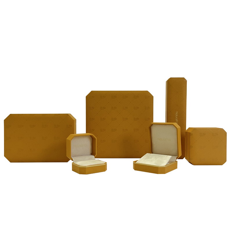 Achteck-Form fertigte Schmuck-Verpackenkasten mit Goldlinie besonders an